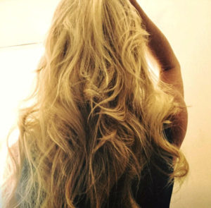 Amber blonde wavy long hair