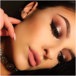 formal makeup look with winged eyeliner