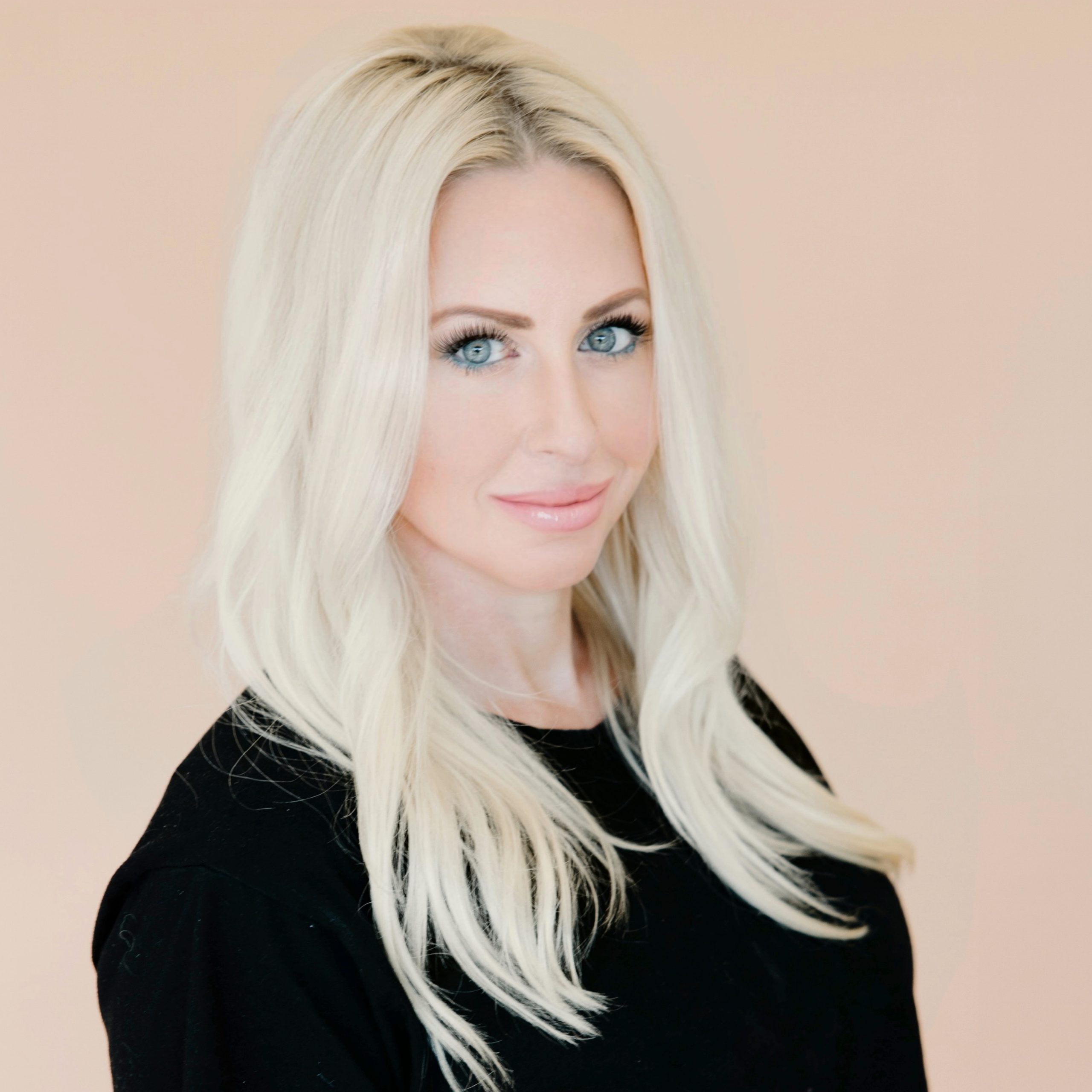 Gemy a blonde hair colorist and salon owner