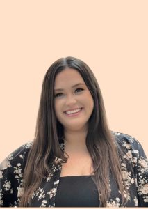 woman with brown hair and a pretty smile